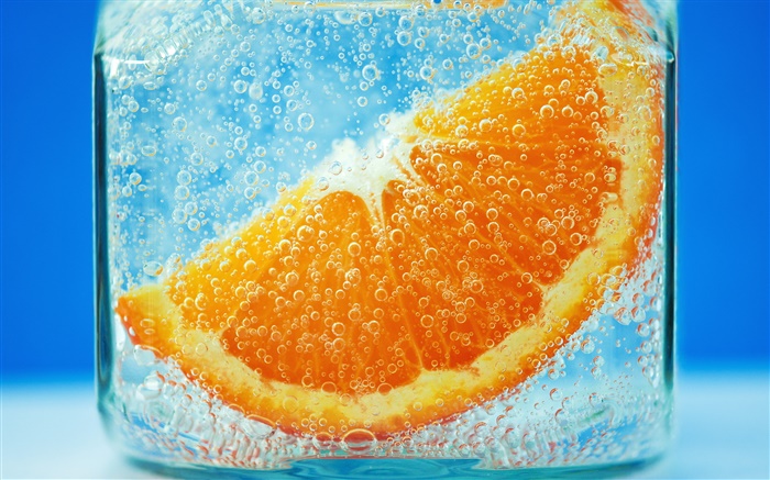 Tranches d'orange dans l'eau, fond bleu, bulle Fonds d'écran, image