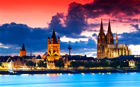 Cologne, en Allemagne, la cathédrale, la ville, la nuit, la rivière, les nuages