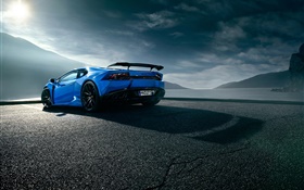 Lamborghini Huracan supercar bleu vue arrière, les nuages